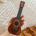 Mini Guitar 4 Strings Classical Ukulele Guitar Toy Musical Instruments for Kids Children Beginners Early Education Small Guitar